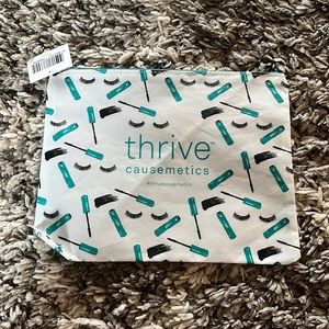 Thrive Causemetics makeup bag